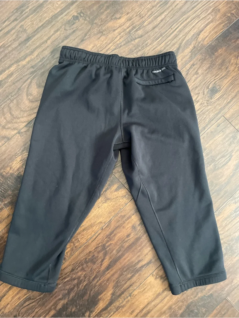 Nike thermo fit Black Capri Sweatpants with White Swoosh